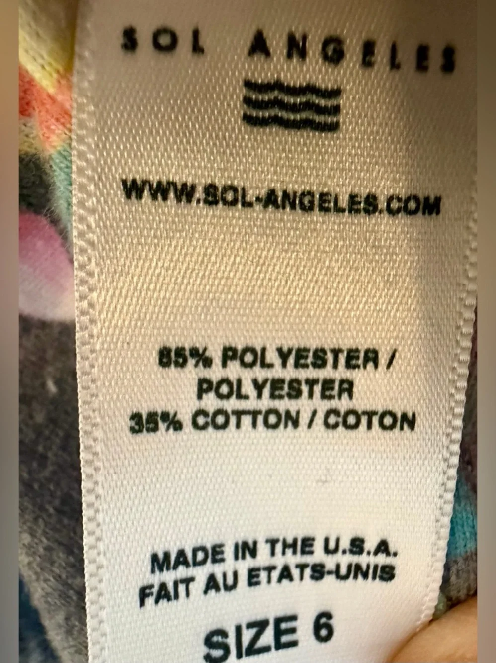 Sol Angeles Cream Label with Navy and Teal Accents